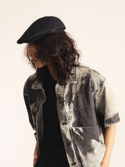 Émile – Casquette plate en coton gaufré – noir intense