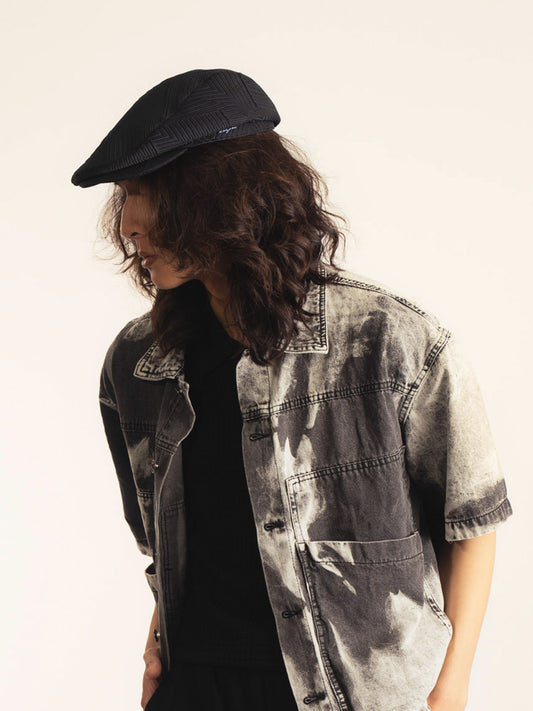 Émile – Casquette plate en coton gaufré – noir intense